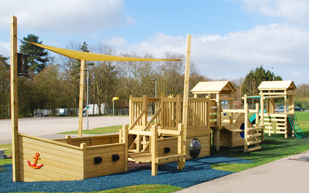 Playground apparatus with wooden ship